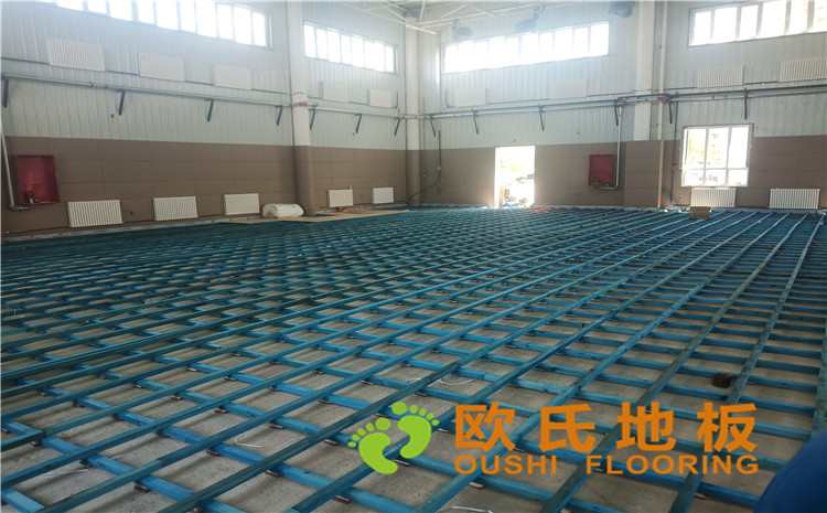 新疆克拉瑪依市獨(dú)山子虹園小區(qū)體育館木地板項(xiàng)目-歐氏運(yùn)動(dòng)木地板